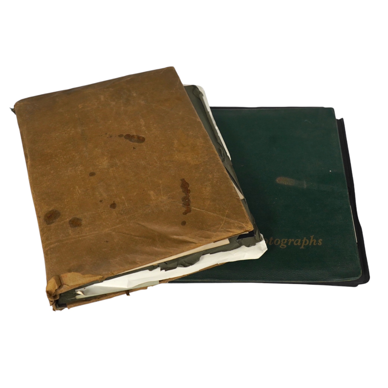 Two 1940s family photograph albums, including a few 1930s postcards, two photos of RAF aircraft, as well as military photographs of soldiers in uniform, etc. Condition - poor to fair